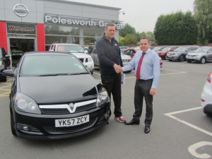 Mr Anthony Andrews collecting his Vauxhall Astra from Our Sales Manager Steve Sadler.