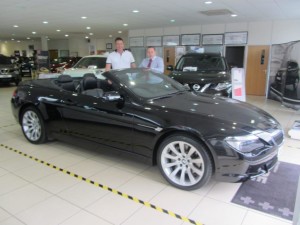 Returning Customer Darren Anderson with our Sales Manager Steve Sadler exciting awaiting to drive away his BMW 6 Series Cabriolet
