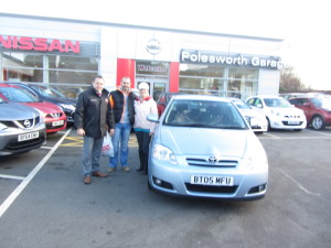 Mr & Mrs Wood collecting their Toyota Corolla from our Sales Manager Steve Sadler