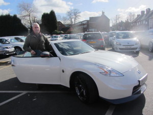 Mr Chris Clark getting ready to drive off in his dream car the Nissan 370Z Nismo