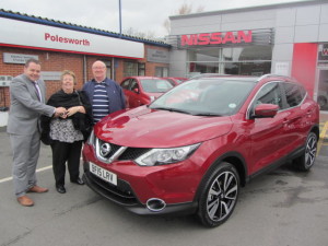 Mr Ryland Vaughan and Mrs Carol Vaughan collecting their New Nissan Qashqai from Our Sales Manager Steve Sadler