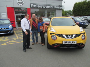 Mr and Mrs Huxley collecting their Brand New Juke In The Fabulous Sun Yellow from Our Sales Manager Steve Sadler