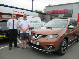 Mr Sharratt Collecting his New Nissan X Trail In Copper Blaze From Our Sales Executive Phil Tierney