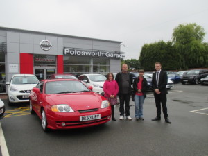 Mr Steven Horry and Family From Lincolnshire collecting their Hyundai Coupe From Our Sales Executive Phil Tierney