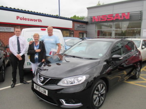 Returning Customers Mr & Mrs Jewkes taking delivery of the the fabulous  New Top Of The Range Nissan Pulsar from Our Sales Executive Phil Tierney