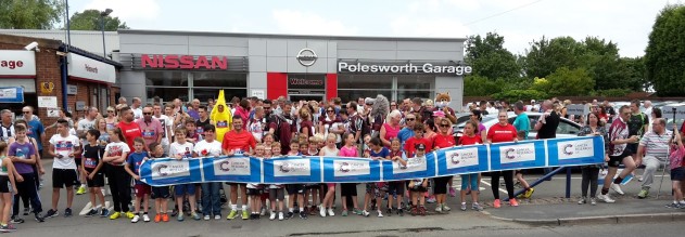 Crowds gather outside Polesworth Garage