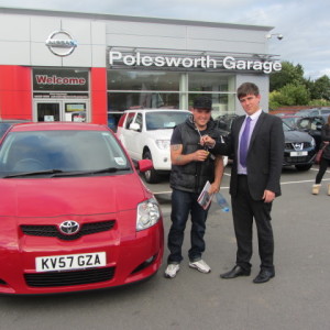 Kieran McCormack collecting his Toyota Auris from Our Sales Executive Jon Taylor