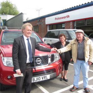 Mr Barber collecting his new Nissan Navara from our Sales Executive Paul Tomson.