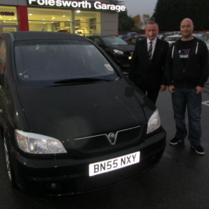 Mr Mark Barton collecting his new Vauxhall Zafira from our Sales Executive Roy Bettaney