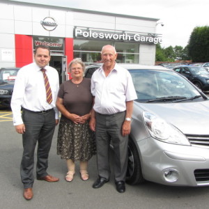 Mr & Mrs Parkes collecting their new Nissan Note from our Sales Manager Steve Sadler