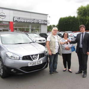 Mr Tomlinson collecting his new Qashqai from our Sales Executive Jon Turner