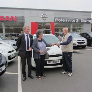 Mr and Mrs Price collecting their new Nissan Micra from our Sales Executive Paul Tomson