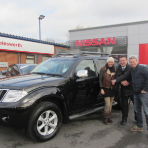Our New Salesman David Page handing over the keys to Carl Flavell Hairdressing the proud owners of their New Nissan Navara