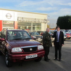 Paul Brown collecting his Suzuki Grand Vitara from our Sales Executive Jon Taylor