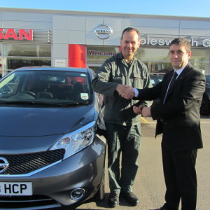Mr Anthony Murray collecting his New Nissan Note from our Sales Executive Mark Bolton
