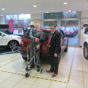 Mr Mark Humphries collecting his New Nissan Qashqai from Our Sales Manager Steve Sadler