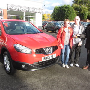 Mr & Mrs Albrighton collecting their new Nissan Qashqai from our Sales Executive Paul Tomson