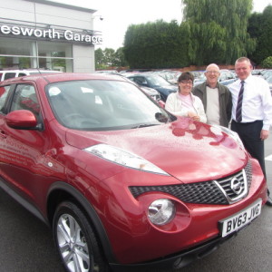 Mr & Mrs Farrell collecting their new Nissan Juke from our Sales Executive Roy Bettaney