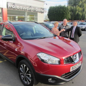 Mr & Mrs Price collecting their new Nissan Qashqai from our Sales Executive Mark Bolton