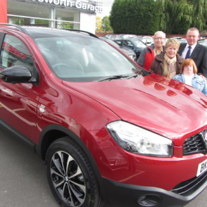 Mr & Mrs Satchwell & Emily collecting their new Nissan Qashqai + 2 from our Sales Executive Roy Bettaney
