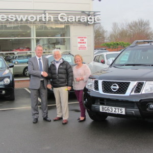 Mr & Mrs Smith collecting their New Nissan Navara from our Sales Executive Paul Tomson