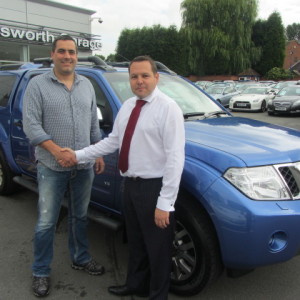 Mr Robin Tobin of The Dental Centre collecting his new Nissan Navara from our Sales Manager Steve Sadler