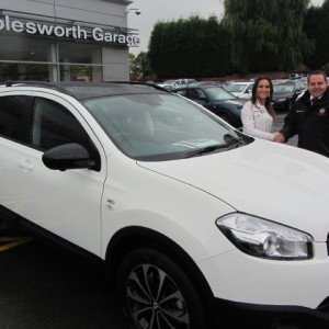 Mrs Scilla Farina collecting her new Nissan Qashqai +2 from our Sales Manager Steve Sadler