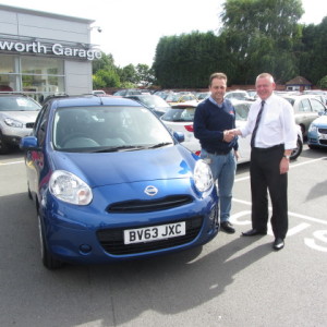 Nigel Privett collecting his new Nissan Micra from our Sales Executive Roy Bettaney