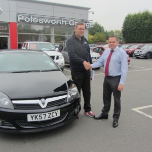 Mr Anthony Andrews collecting his Vauxhall Astra from Our Sales Manager Steve Sadler.