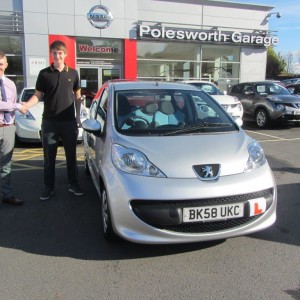 Mr Mitchell Hancock collecting his Peugeot 107 from Our sales Executive Adam Hickinbottom