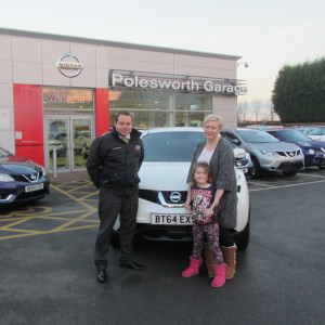 Ms Charlotte Harborne and Addison collecting their new Nissan Juke which Addison has already named Bertie from our Sales Manager Steve Sadler