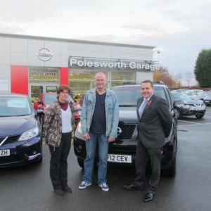 Paul Johnson collecting his Nissan Pathfinder from Our Sales Manager Steve Sadler, This is the 2nd Pathfinder Mr Johnson has purchased from Polesworth Garage.