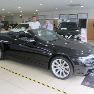 Returning Customer Darren Anderson with our Sales Manager Steve Sadler exciting awaiting to drive away his BMW 6 Series Cabriolet