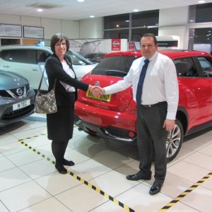 Returning Customer Mrs Joanne Brundell Carty collecting her new Nissan Juke from Our Sales Manager Steve Sadler 2
