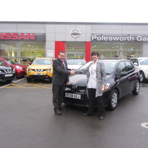 MS Sarah Ann Moss collecting her Toyota Auris From Our Sales Manager Steve Sadler