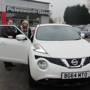 Returning-Customers-Mr-Mrs-Leonard-ready-to-drive-off-in-their-New-Nissan-Juke-they-purchased-from-our-Sales-Manager-Steve-Sadler.jpg