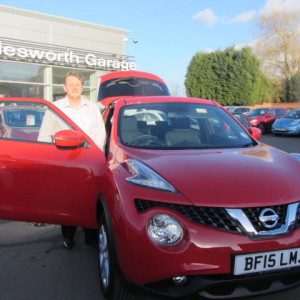 Mr Matthew Smith ready to drive away in his new Nissan Juke