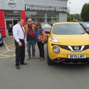 Mr and Mrs Huxley collecting their Brand New Juke In The Fabulous Sun Yellow from Our Sales Manager Steve Sadler