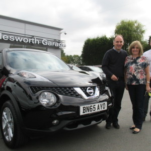 Mr And Mrs Finn Collecting Their New Nissan Juke From Our Sales Executive Phil Tierney
