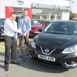 Mr Lee Pitcher Collecting His New Nissan Pulsar From Our Sales Manager Steve Sadler