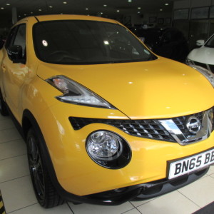 Nissan Juke In Sunset Yellow With Exterior Sport Pack And Matt Black Spoiler Ready To Be Collected By Its New Owner