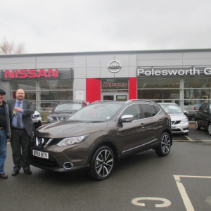Mr And Mrs Hubbard Collecting Their Top Of The Range Nissan Qashqai With Chrome Pack From Our Sales Executive Matthew Newman